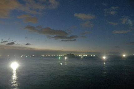 Night ocean, all the lights are fishing boats